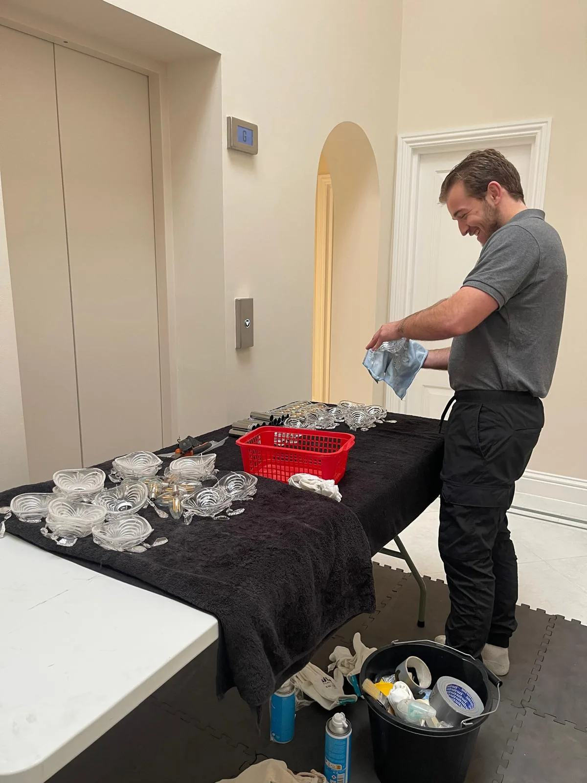Zac preparing individual crystal pieces at the table